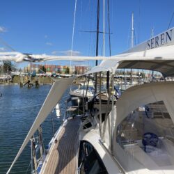 Oyster 495 with Bimini and Walk under Sides designed by Dolphin Sails