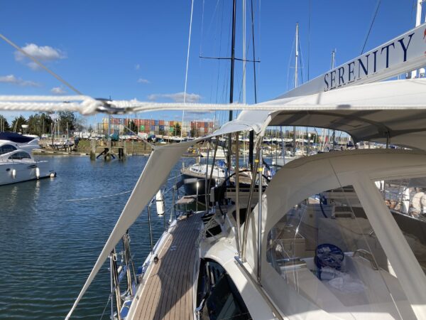 Oyster 495 with Bimini and Walk under Sides designed by Dolphin Sails