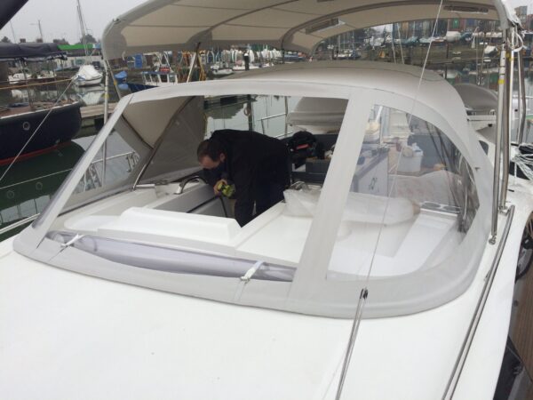 Oyster Sprayhood with Roll Down Central Window by Dolphin Sails.