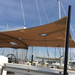 Oyster 495 Aft Deck Awning, Carbon Poles and Fishing Pole Holders - By Dolphin Sails