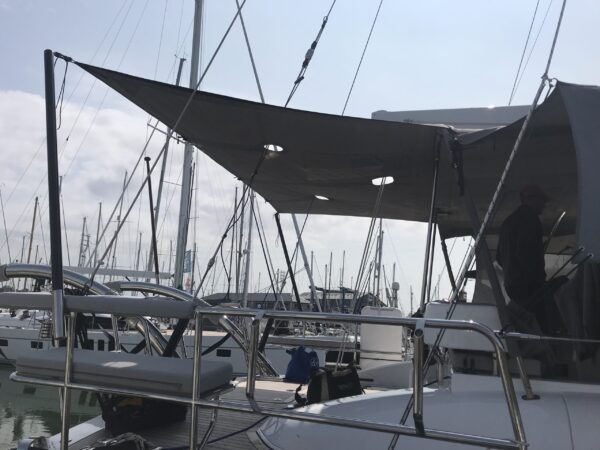 Oyster 495 Aft Deck Awning, Carbon Poles and Fishing Pole Holders - By Dolphin Sails