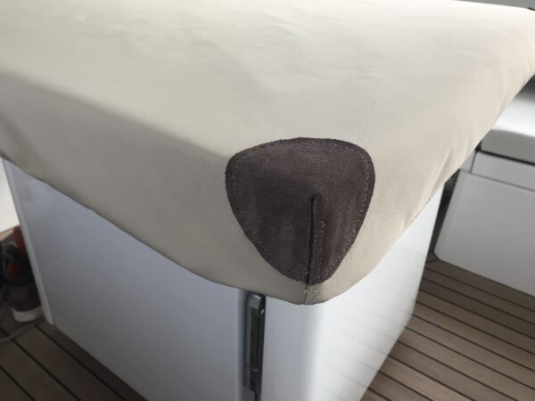 Table Cover with Leather Corners for Oyster Yachts by Dolphin Sails.