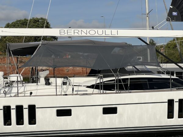Oyster 495 with Bimini and Walk under Sides designed by Dolphin Sails